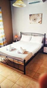 Ένα ή περισσότερα κρεβάτια σε δωμάτιο στο Kallikrateia's villa next to the sea