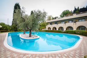 Bazén v ubytování Hotel Porta Del Sole nebo v jeho okolí