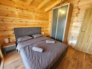 Voodi või voodid majutusasutuse Estuary Cottage Ada Bojana toas