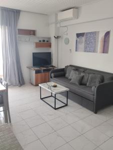 TV a/nebo společenská místnost v ubytování Atlas-Unlimited Sea View Apartment