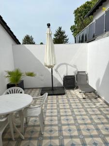 Balkón nebo terasa v ubytování Ferienhaus Zum Heilbrunnen