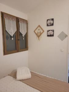 Letto o letti in una camera di Villa Acqua Doria