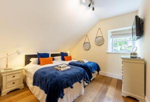 Ένα ή περισσότερα κρεβάτια σε δωμάτιο στο 9 Fernhill Penthouse