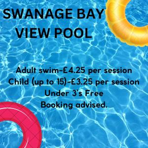 a poster of a swimming pool with an orange buoyancy ball in the water at Stunning Caravan on Swanage Bay View Holiday Park in Swanage