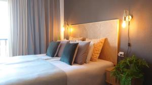 Ένα ή περισσότερα κρεβάτια σε δωμάτιο στο Carmen Apartamento Emilia