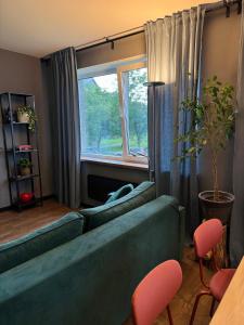 Area soggiorno di Little green studio in Maardu