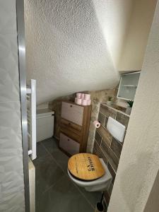 Ένα ή περισσότερα κρεβάτια σε δωμάτιο στο Appartement tout équipé au cœur du village