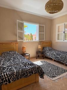 Postel nebo postele na pokoji v ubytování Luxurious Villa