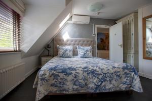 Postel nebo postele na pokoji v ubytování Zenzez Hotel & Lounge