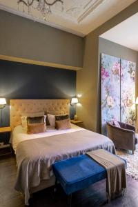 Postel nebo postele na pokoji v ubytování Zenzez Hotel & Lounge