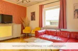 โทรทัศน์และ/หรือระบบความบันเทิงของ Hofgut Eveshausen - Das Ferienhaus in der Natur für Familien und Gruppen