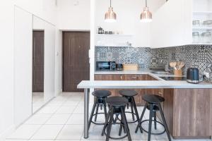 Kuchyň nebo kuchyňský kout v ubytování Wyjątkowy Apartament na Rynku