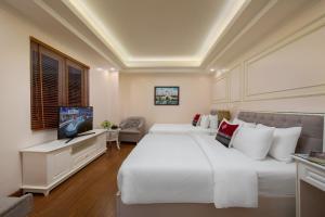 TV a/nebo společenská místnost v ubytování Sapa Praha Hotel