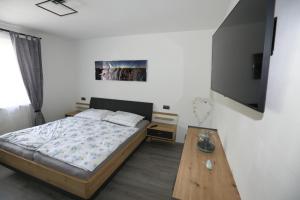 Postel nebo postele na pokoji v ubytování Ferienwohnung Sölkner