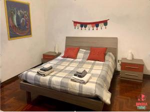 Postel nebo postele na pokoji v ubytování Brixia Time Case - In villa con giardino