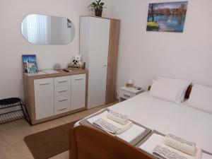 Studio apartman TEDY客房内的一张或多张床位