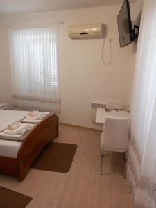 Studio apartman TEDY客房内的一张或多张床位