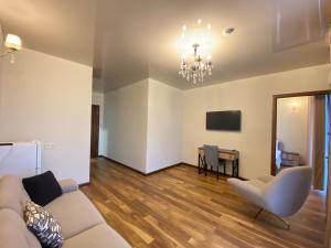 TV a/nebo společenská místnost v ubytování Hotel Leonardo