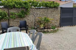 Zahrada ubytování Maison de charme rénovée proche océan Domino + 4 fotografie