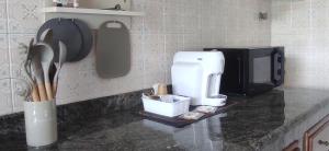 A kitchen or kitchenette at CAPERCIA home
