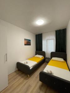 Postel nebo postele na pokoji v ubytování Starigrad Paklenica-Josipa apartmani
