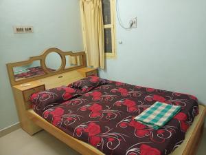 Ένα ή περισσότερα κρεβάτια σε δωμάτιο στο Jeeva Guest House +5 φωτογραφίες