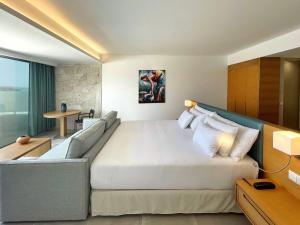 Ένα ή περισσότερα κρεβάτια σε δωμάτιο στο Barceló Praia Cape Verde