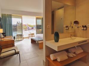 Ένα ή περισσότερα κρεβάτια σε δωμάτιο στο Barceló Praia Cape Verde