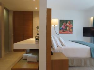 Ένα ή περισσότερα κρεβάτια σε δωμάτιο στο Barceló Praia Cape Verde
