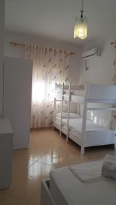 Postel nebo postele na pokoji v ubytování Bello Apartaments