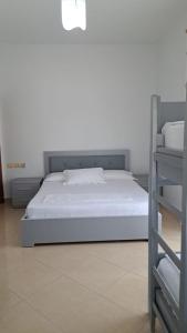 Postel nebo postele na pokoji v ubytování Bello Apartaments