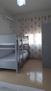 Postel nebo postele na pokoji v ubytování Bello Apartaments