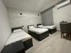 Postel nebo postele na pokoji v ubytování Regal Hotel + 16 fotografií