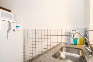 Η κουζίνα ή μικρή κουζίνα στο Sol & Charme em Santa Teresa +42 φωτογραφίες