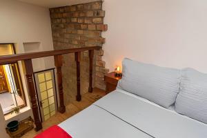 Ένα ή περισσότερα κρεβάτια σε δωμάτιο στο Sol & Charme em Santa Teresa