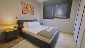 Postel nebo postele na pokoji v ubytování STAY Lima Soul Apartment