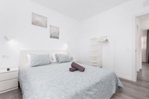 Ein Bett oder Betten in einem Zimmer der Unterkunft La Lajita Barca Beach Sunset