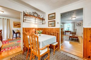 a dining room with a table and chairs at Salisbury Cottage about 7 Mi to High Rock Lake! in Salisbury