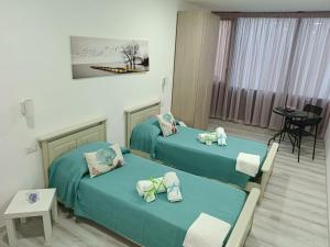 Postel nebo postele na pokoji v ubytování B&B PalmaViola