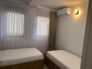 Postel nebo postele na pokoji v ubytování Treva Hotel & Apartaments