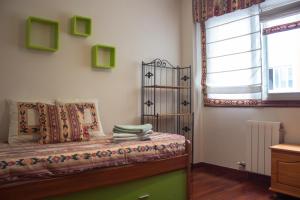 Postel nebo postele na pokoji v ubytování Apartamento playa Sabarís-Baiona