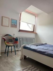 Katil atau katil-katil dalam bilik di Apartament Franciszkańska
