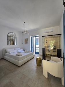A bed or beds in a room at Terra Muronis Hotel Diffuso