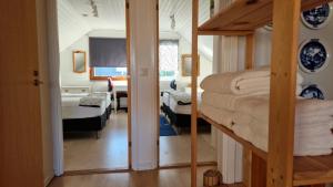 Cama ou camas em um quarto em Vindsvåning i Simrishamn