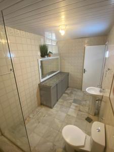 Koupelna v ubytování Quarto com varanda privada 3
