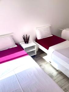 Letto o letti in una camera di Marvelsun