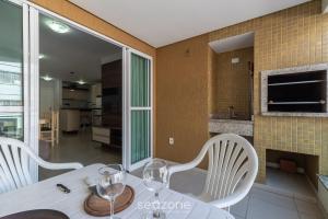 Køkken eller tekøkken på RFO - Apartamentos a poucos passos da Praia de Bombinhas