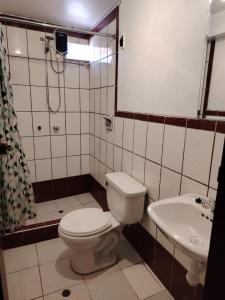 Koupelna v ubytování Conquistador Hotel