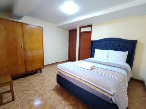 Postel nebo postele na pokoji v ubytování Conquistador Hotel