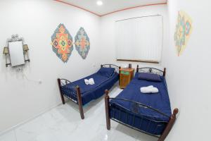 Voodi või voodid majutusasutuse Armena Hostel toas